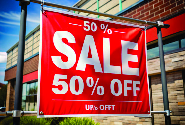 Red sign: 50% Sale, 50% Off.